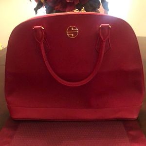 Red leather handbag